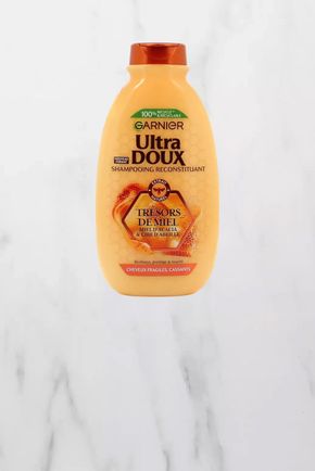 Le Shampoing reconstituant miel  "Garnier"
