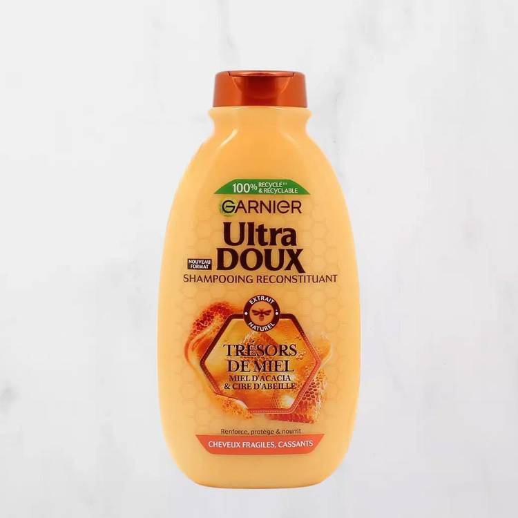 Le Shampoing reconstituant miel  "Garnier"