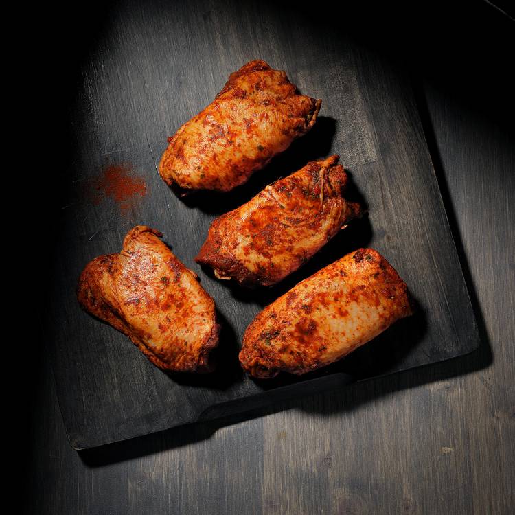 Les Hauts de cuisse de poulet assaisonné paprika