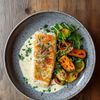 Le Poisson blanc à la sauce citronnée et légumes rôtis