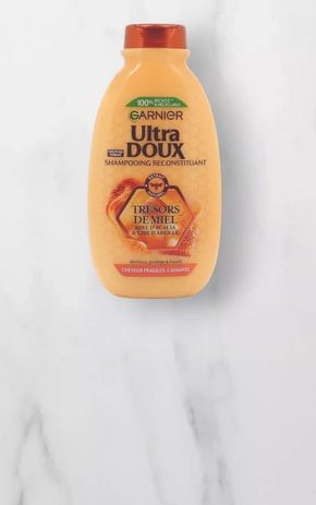 Le Shampoing reconstituant miel  "Garnier"
