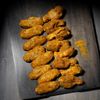 Les Ailes de poulet marinées au curry